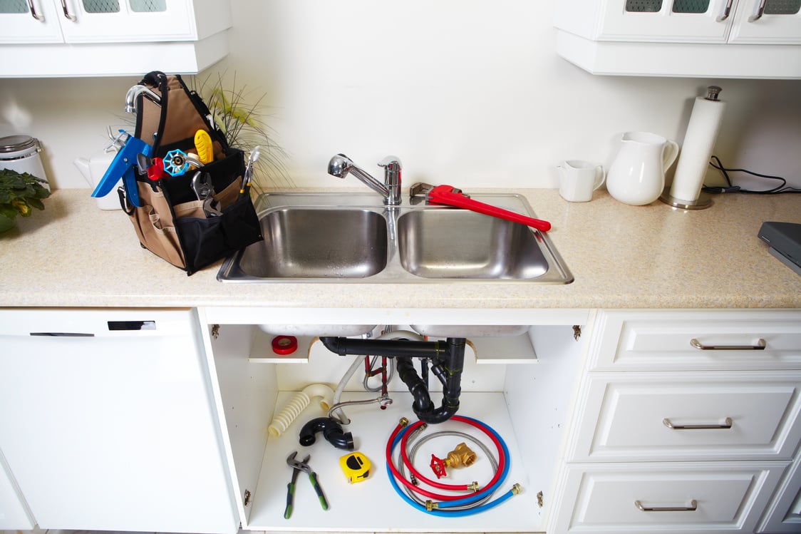 Plumbing tools on the kitchen.